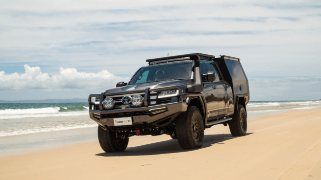 Custom Land Cruiser Driving on Beach